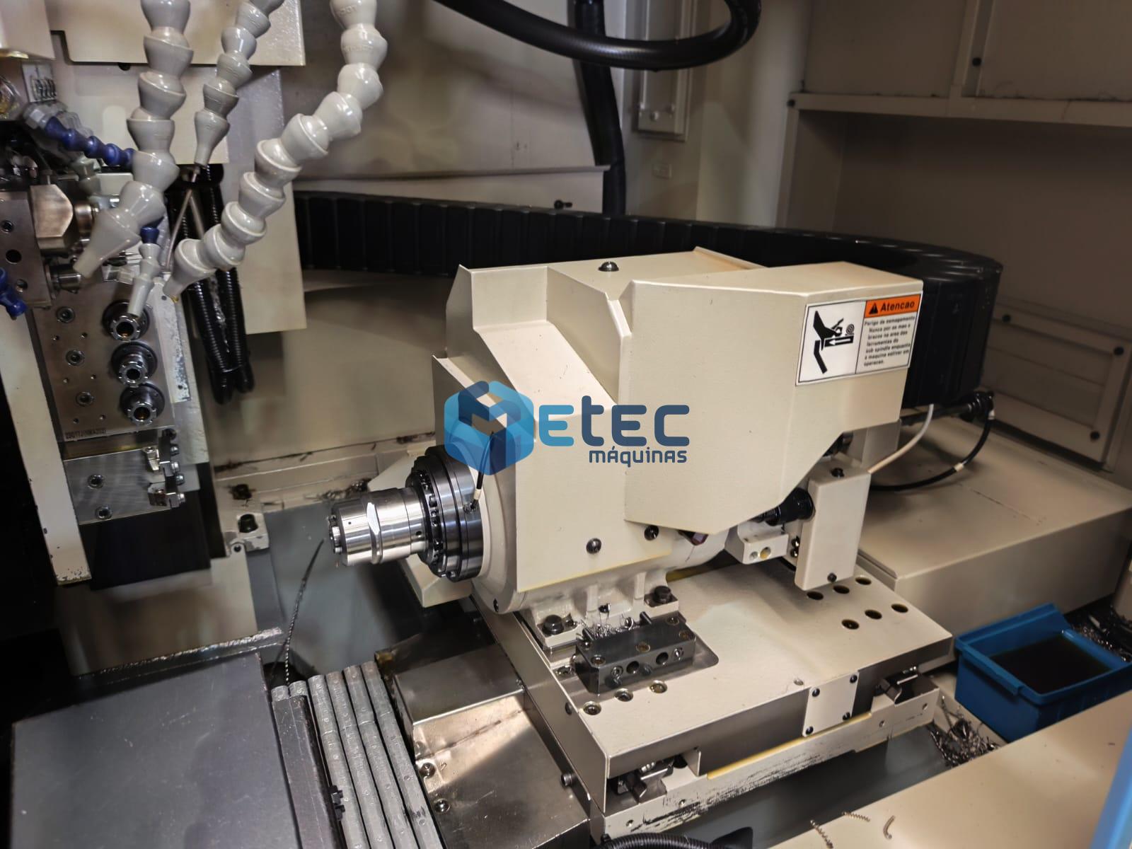 TORNO CNC AUTOMÁTICO DE CABEÇO MÓVEL NOMURA DS