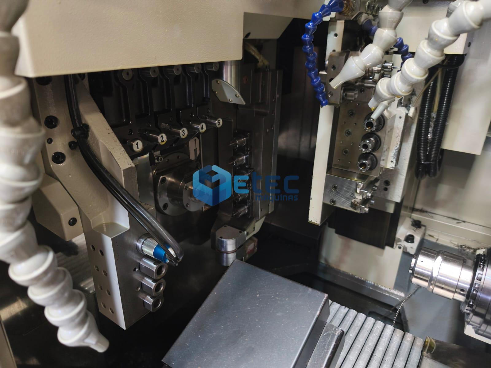 TORNO CNC AUTOMÁTICO DE CABEÇO MÓVEL NOMURA DS