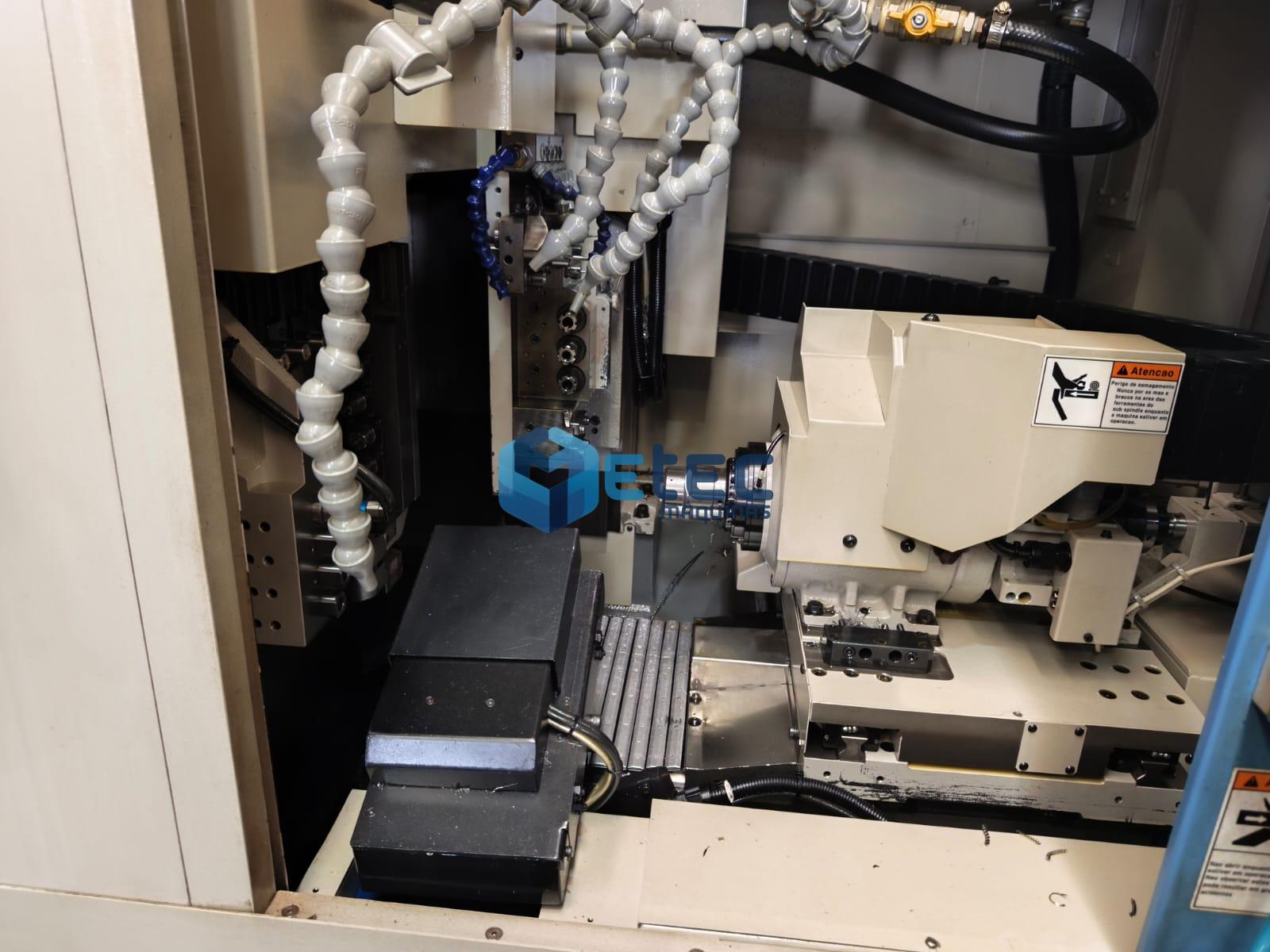 TORNO CNC AUTOMÁTICO DE CABEÇO MÓVEL NOMURA DS