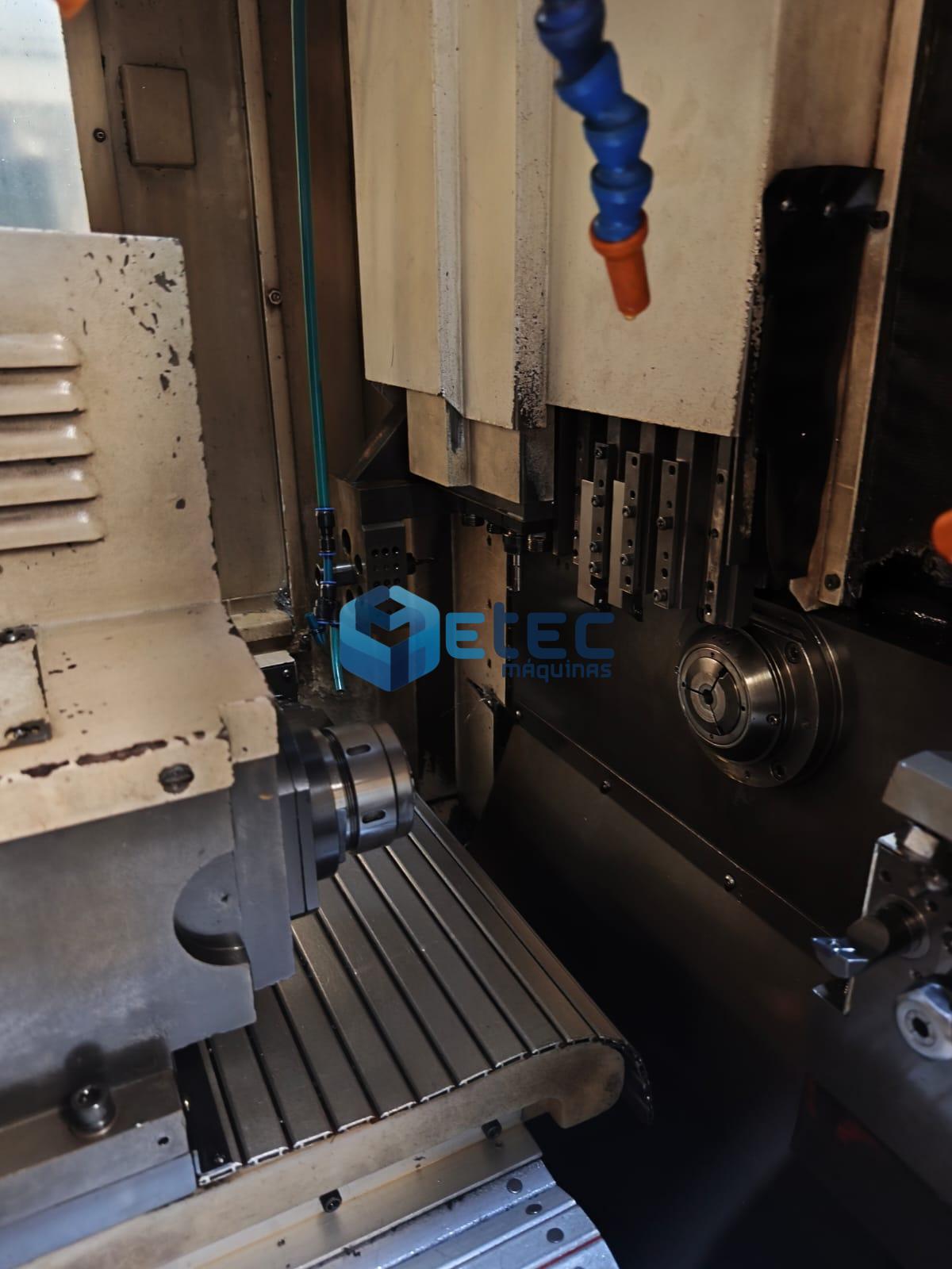 TORNO CNC AUTOMÁTICO DE CABEÇOTE MÓVEL HJM